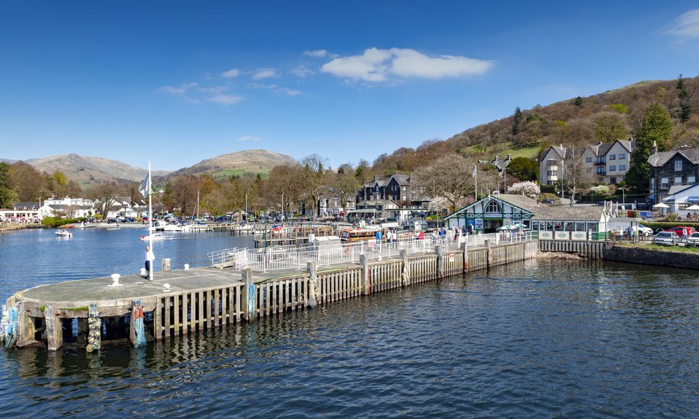 South Lakeland, UK - April 2018: Waterhead Pier at Ambleside, a lakeside town situated at the head of Windermere Lake within the Lake District National Park in England