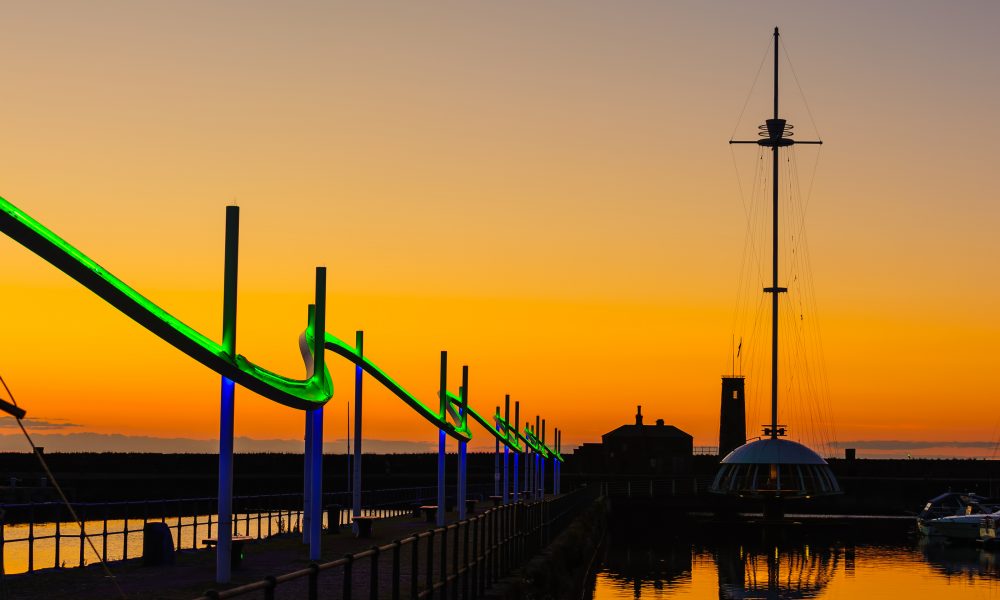 The wave sculpture at sunset in Whitehaven in Cumbria